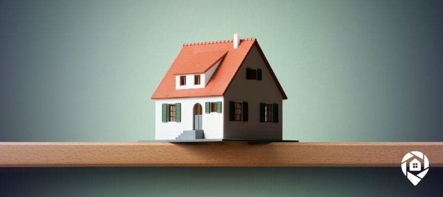 Model house symbolizing a successful $12K wholesale real estate deal.