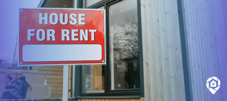 House for rent sign representing 3 rental properties strategy for financial freedom.