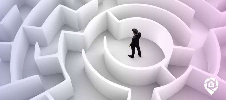 A person in a maze symbolizing the intricacies of corporate skip tracing
