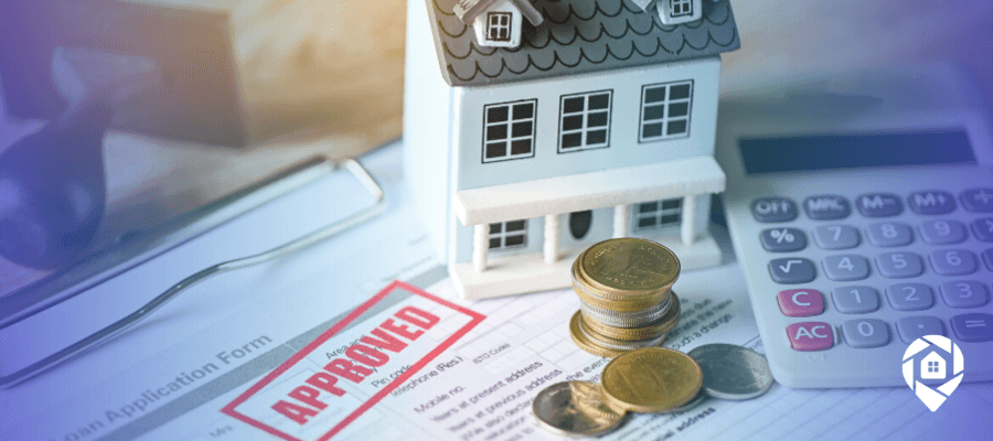 Creative real estate investing with owner financing and subject-to deals, house model, coins, and mortgage approval form.