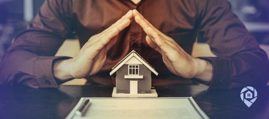 Investor protecting rental property investment, building a real estate portfolio for long-term financial security.