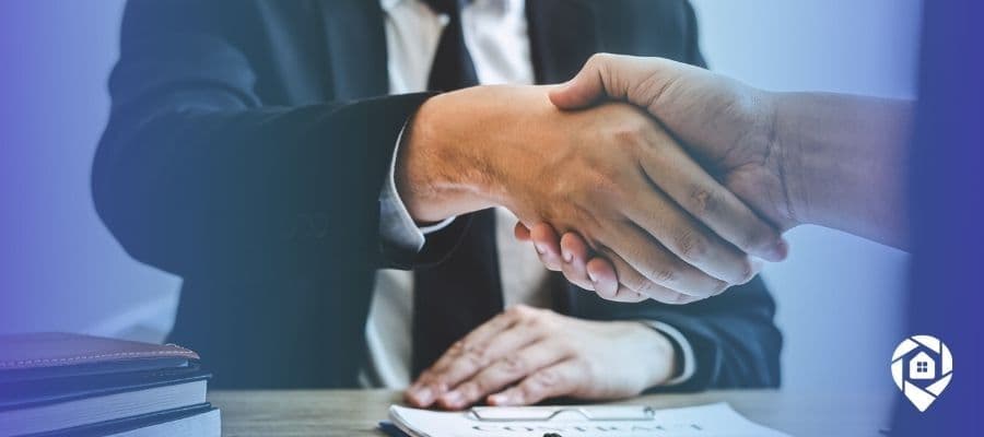 Wholesale property contract signing between investor and seller.