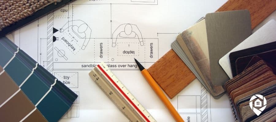 Real estate renovation planning with design samples and materials—representing property flipping strategies.