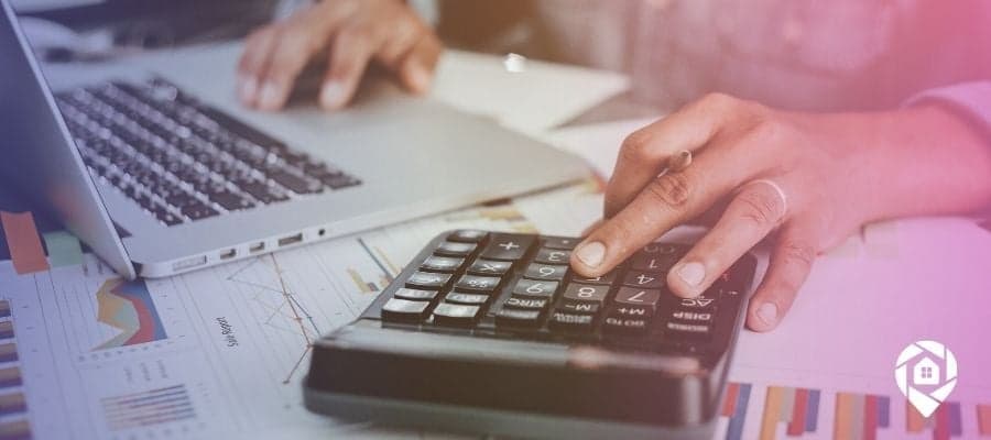 A real estate investor calculating seller finance offer after finding subject to properties.