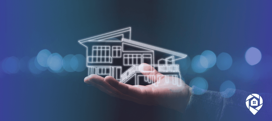 Digital outline of a modern house held in a hand, representing real estate investing and property technology.