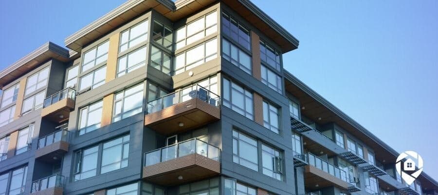 Modern multifamily apartment building used for real estate investing and passive income.