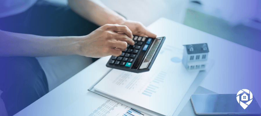 Investor using calculator to analyze numbers for a creative seller financing real estate deal.