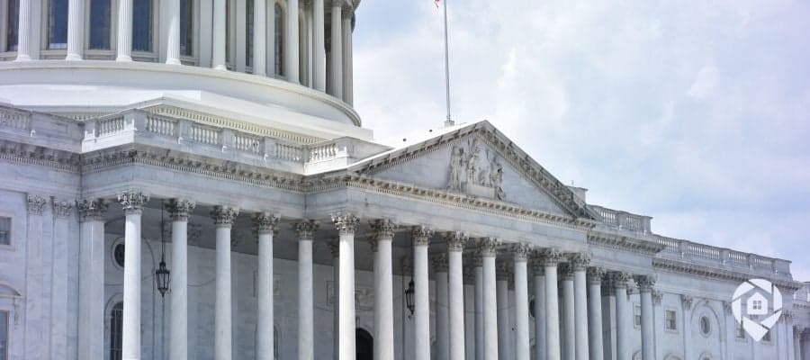 Front view of a government building symbolizing access to public property records for real estate investors.