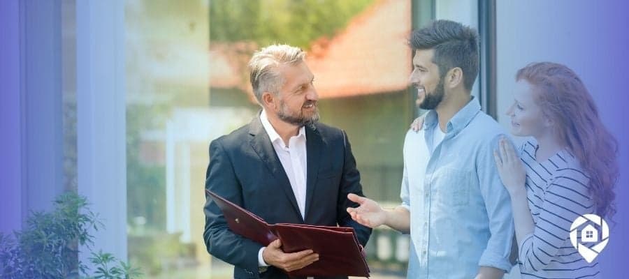 Real estate investor meeting homeowners during a pre-foreclosure consultation at the property door.
