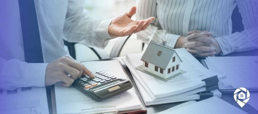 Real estate investor calculating profits using a real estate profit system.