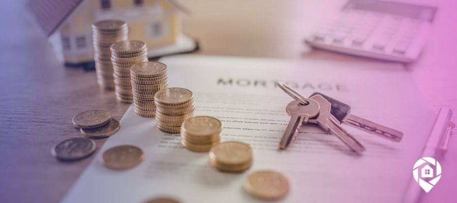 mortgage papers surrounded by keys, coins, and a model house