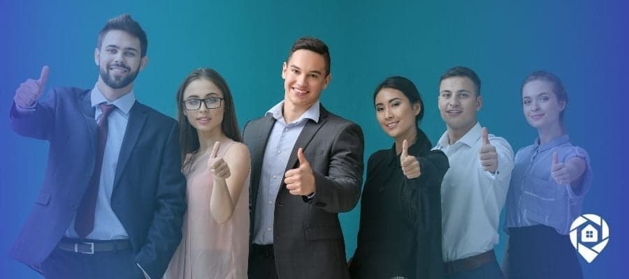 Lean real estate investing team giving thumbs up to successful direct-to-seller marketing strategy.
