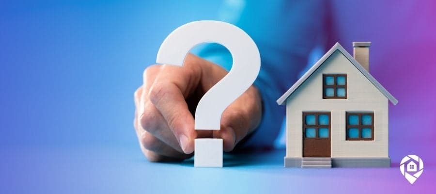 An image of a big question mark and a house next to it for Top 15 Real Estate Investment Questions (Answered) blog banner.